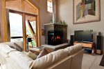 A gas fireplace offers a cozy feel after spending a day in the mountains